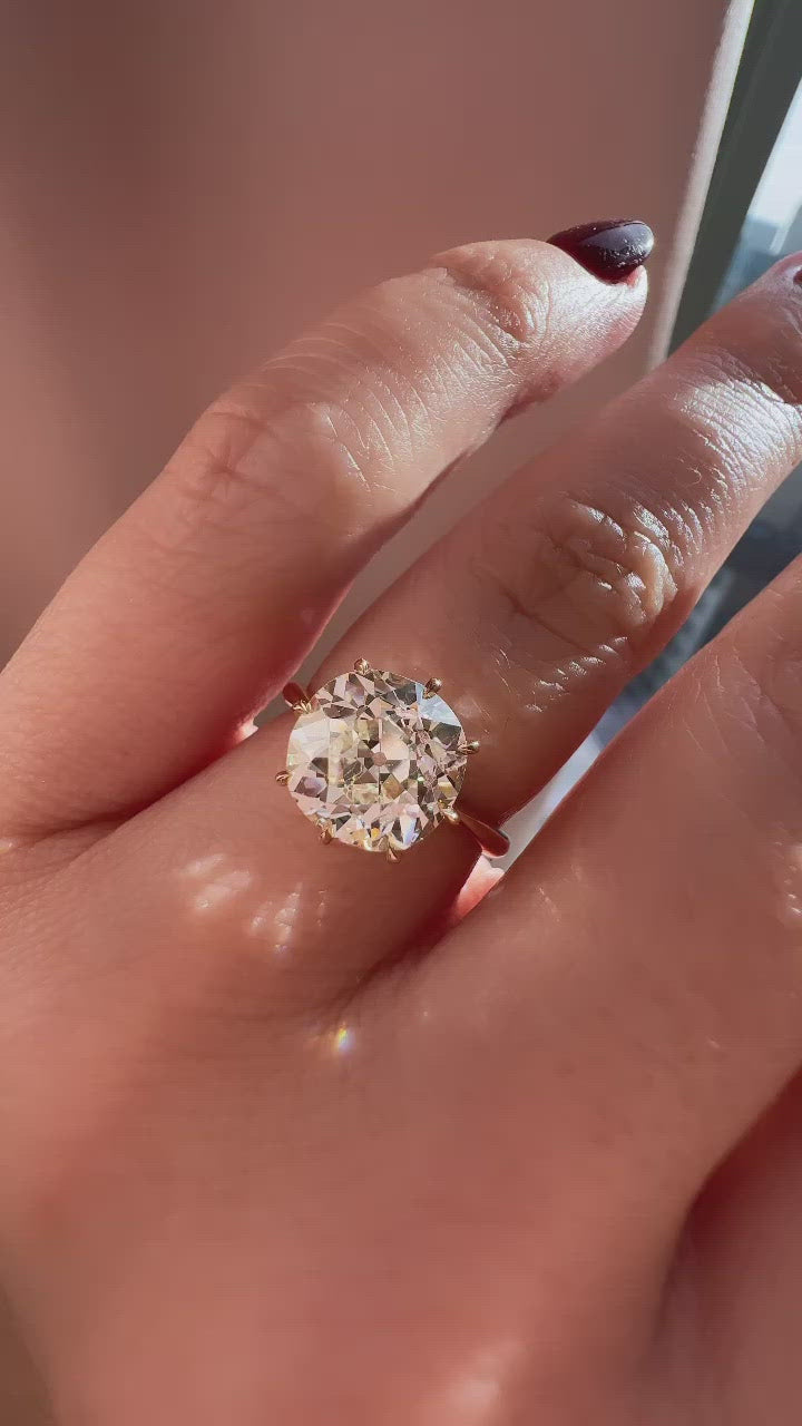 j-k-l color, vs clarity diamond in yellow gold setting