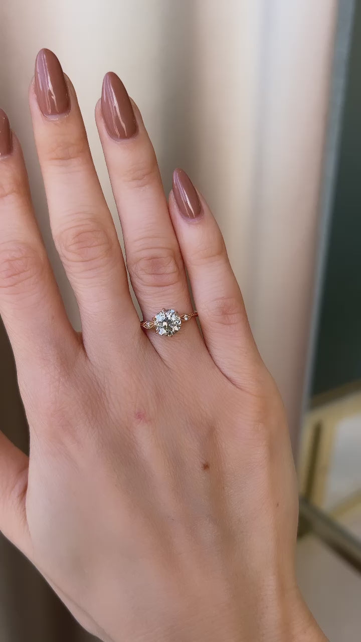 m-z color, vs clarity diamond in yellow gold setting