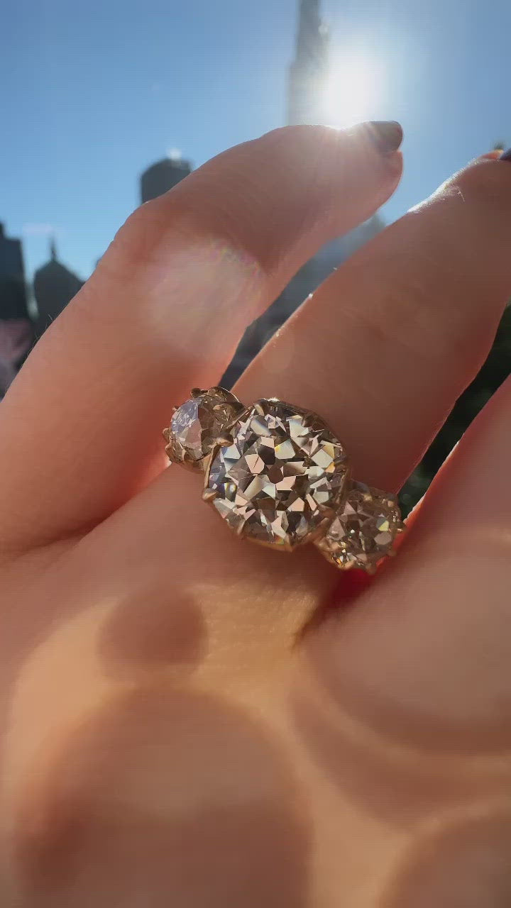 m-z color, si-i clarity diamond in yellow gold setting