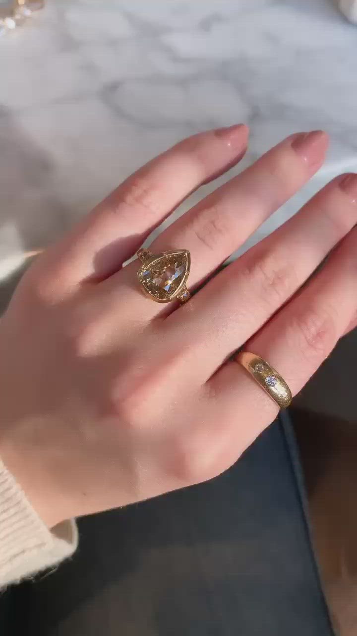 fancy color, si-i clarity diamond in yellow gold setting