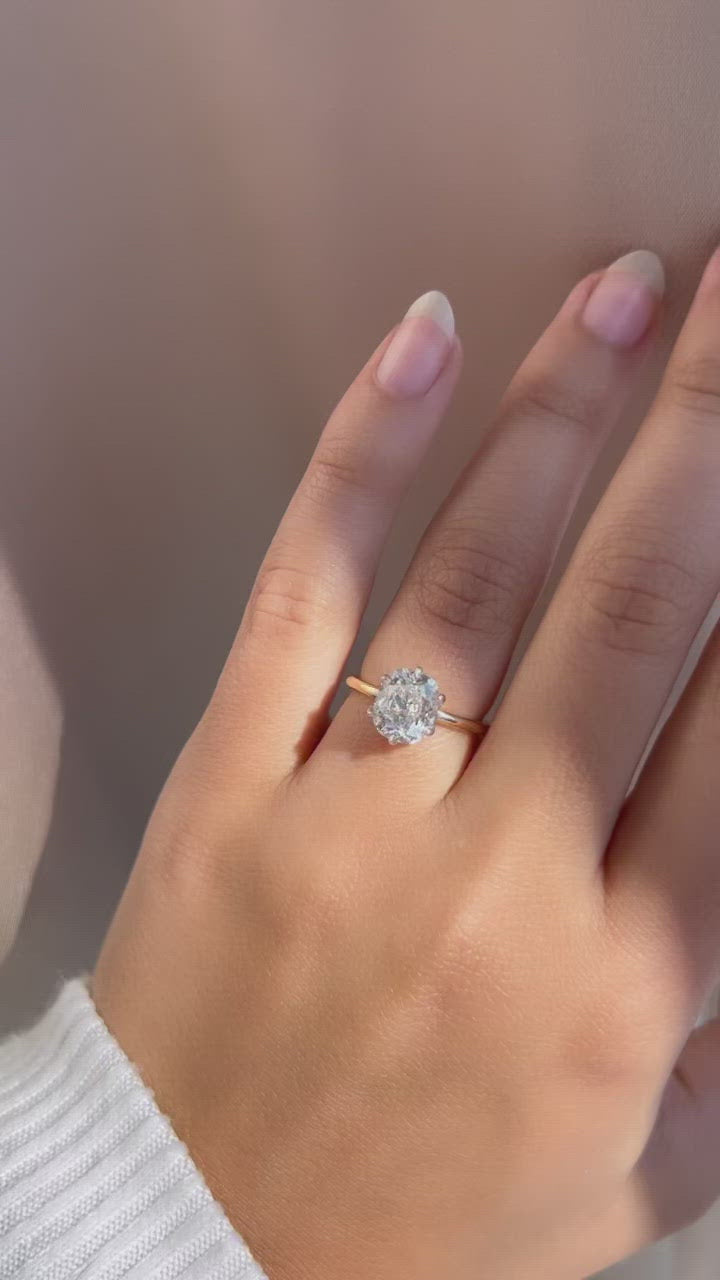 g-h-i color, vs clarity diamond in two-tone setting