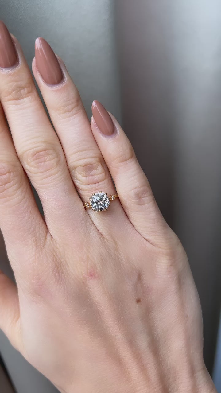 j-k-l color, si-i clarity diamond in yellow gold setting