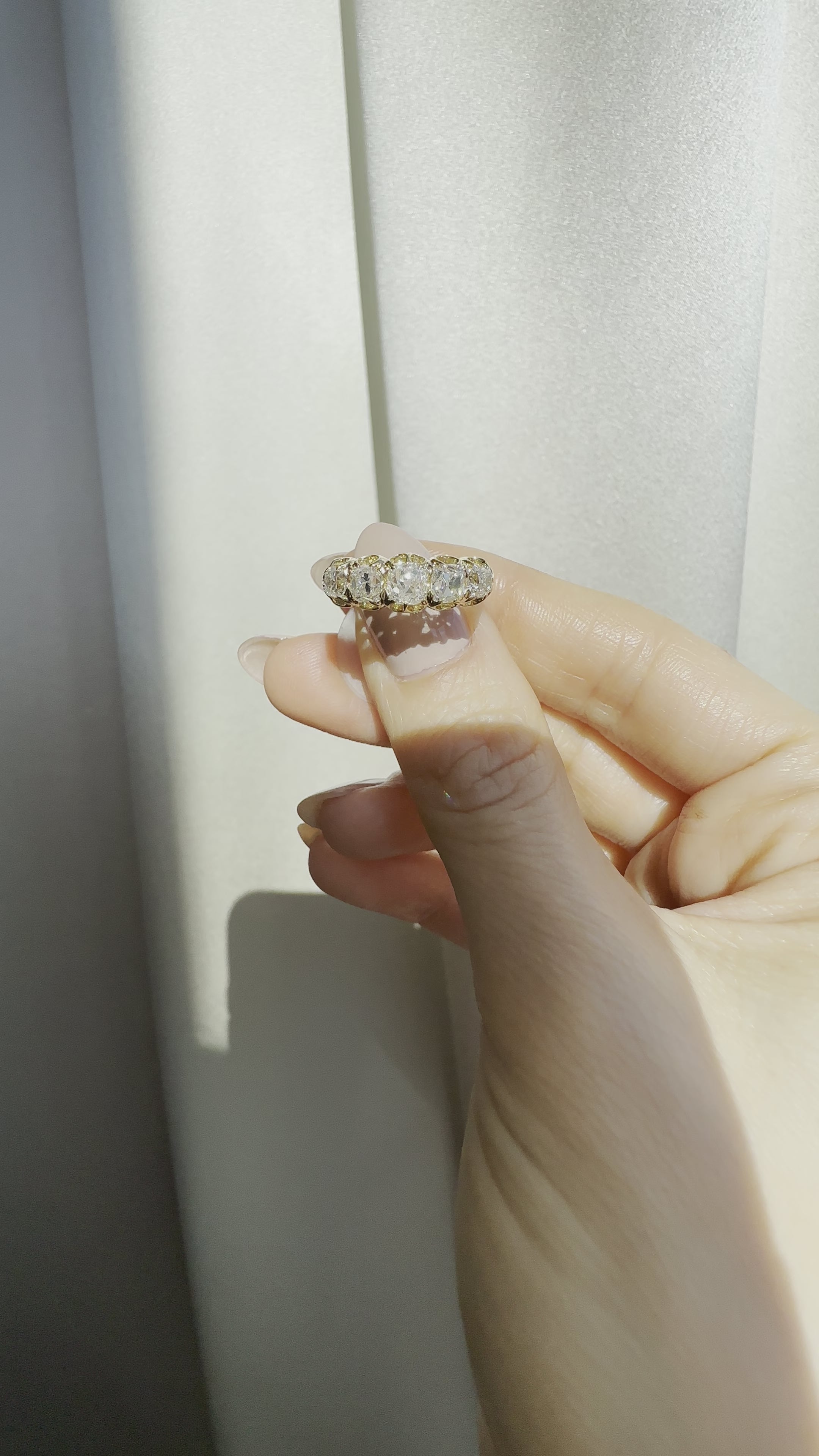 j-k-l color, si-i clarity diamond in yellow gold setting