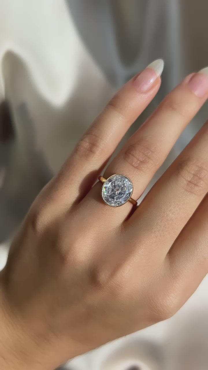 g-h-i color, si-i clarity diamond in yellow gold setting