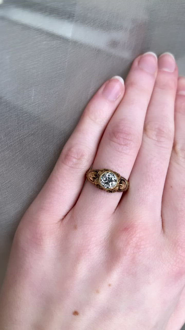 j-k-l color, si-i clarity diamond in yellow gold setting