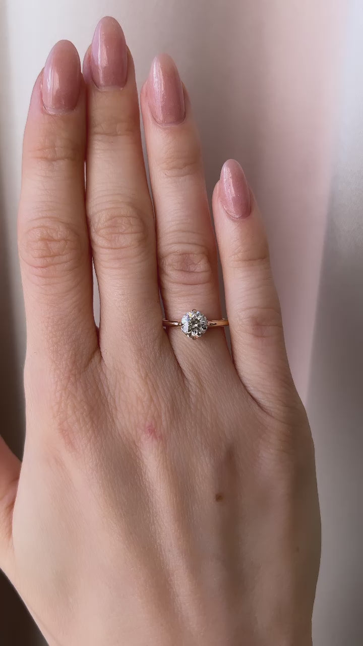 m-z color, si-i clarity diamond in yellow gold setting