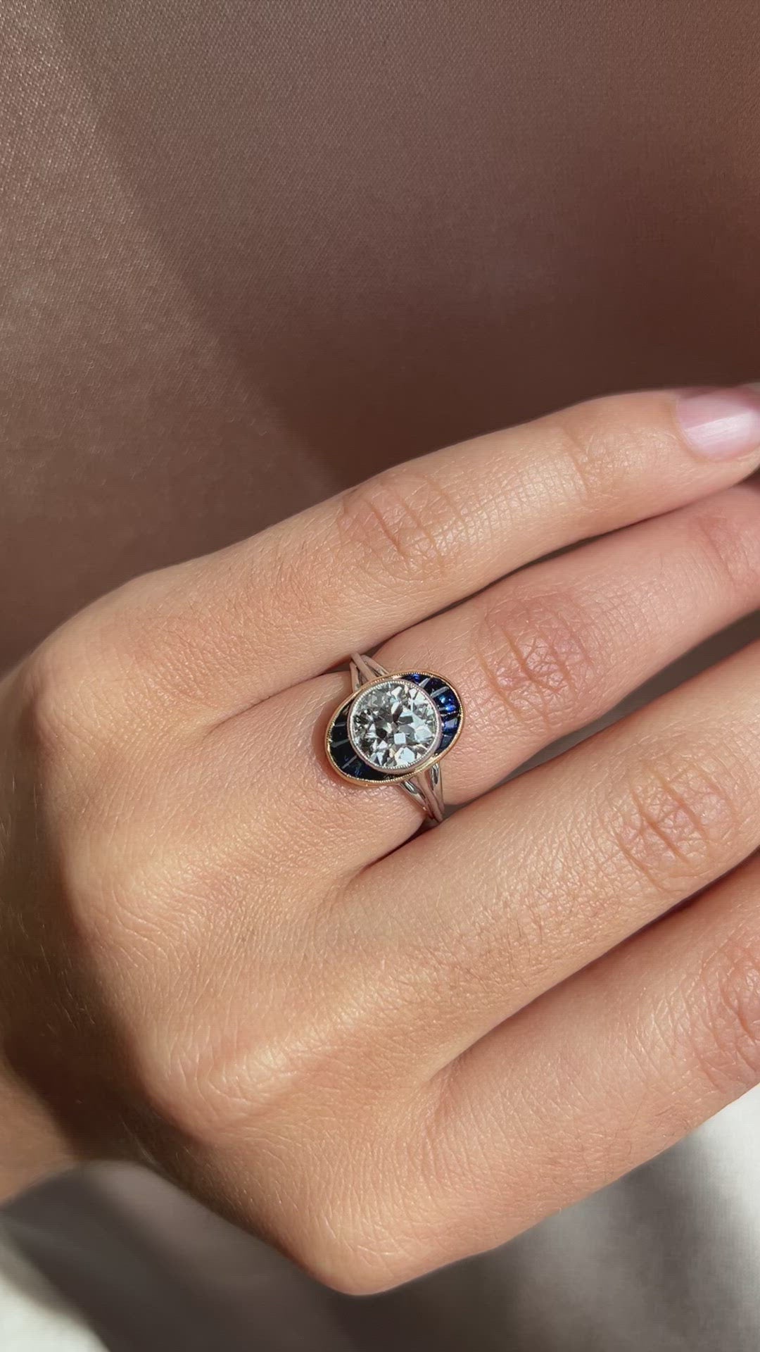 j-k-l color, vs clarity diamond in two-tone setting