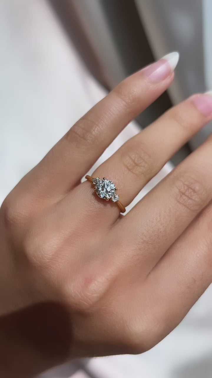 m-z color, vs clarity diamond in yellow gold setting