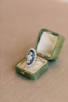Edwardian Vertical Three Stone Halo Vintage Engagement Ring