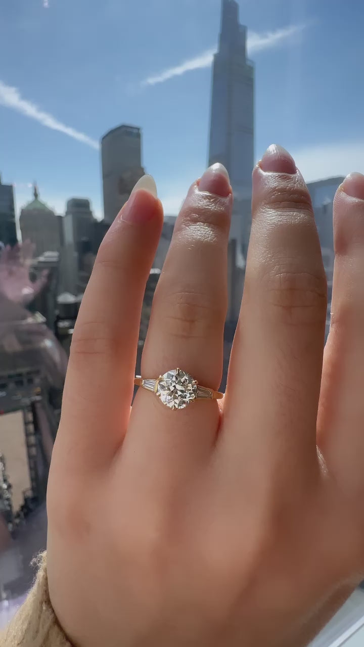 j-k-l color, si-i clarity diamond in yellow gold setting