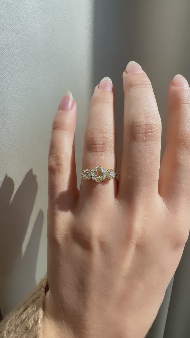 m-z color, si-i clarity diamond in yellow gold setting