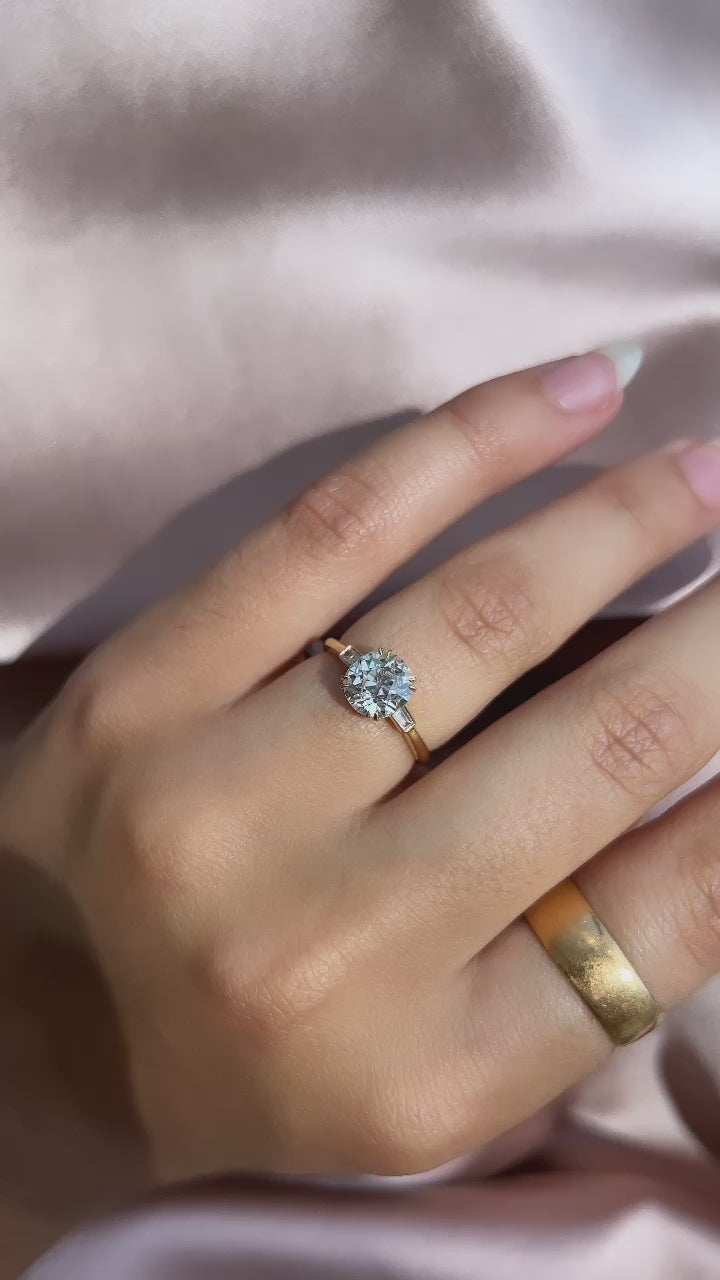 j-k-l color, si-i clarity diamond in yellow gold setting