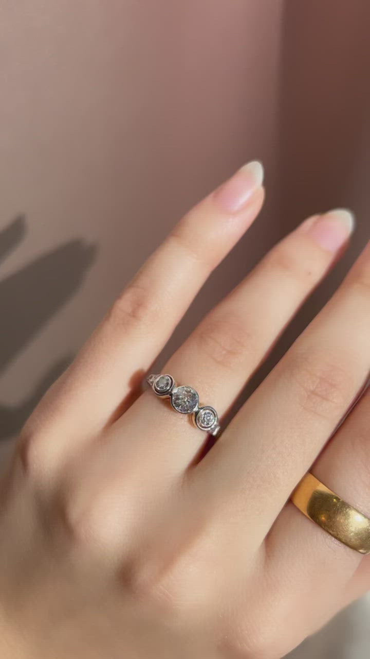 g-h-i color, vs clarity diamond in two-tone setting