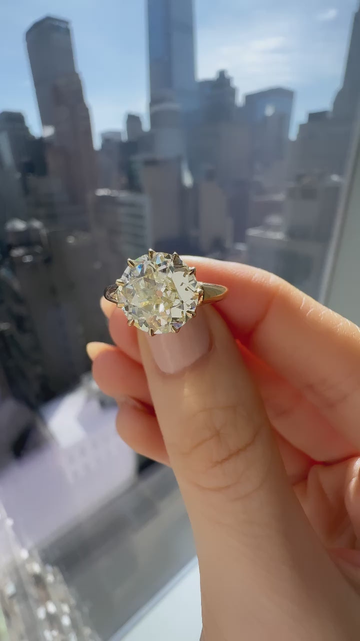 m-z color, vs clarity diamond in yellow gold setting