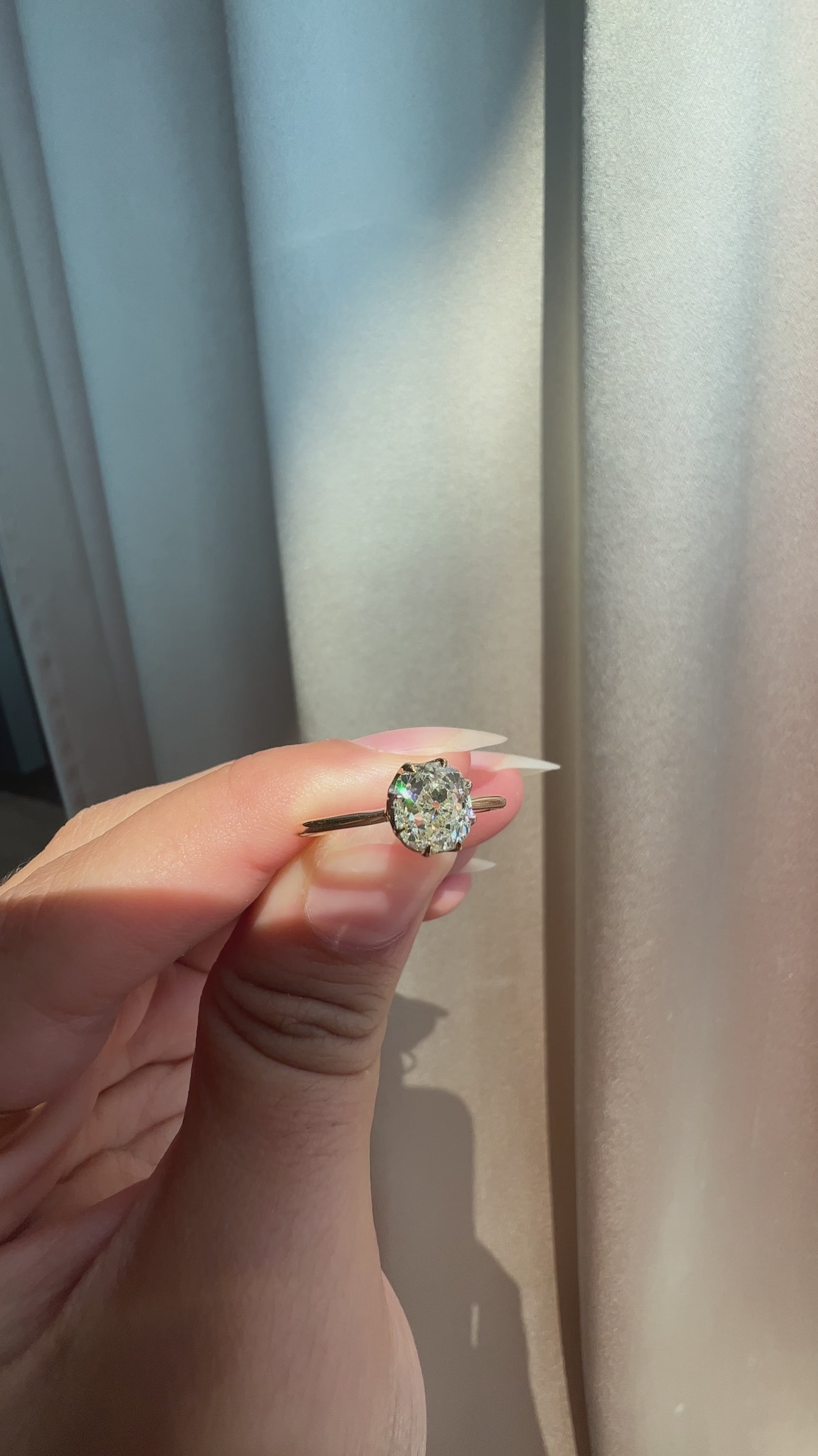 m-z color, si-i clarity diamond in yellow gold setting