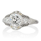 Old Mine Cut Vintage Engagement Ring With Bezel Set Side Stones