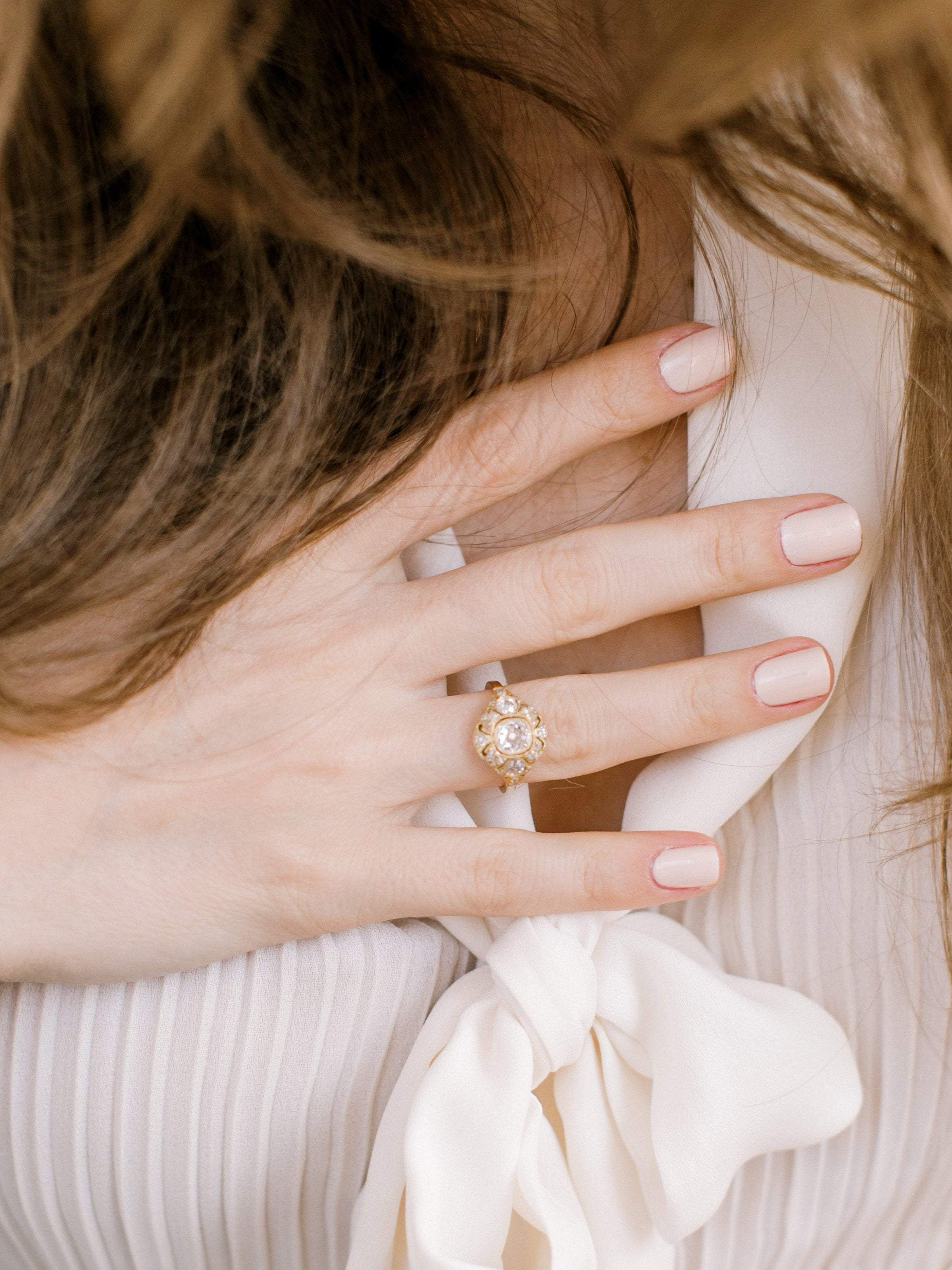 m-z color, vs clarity diamond in yellow gold setting